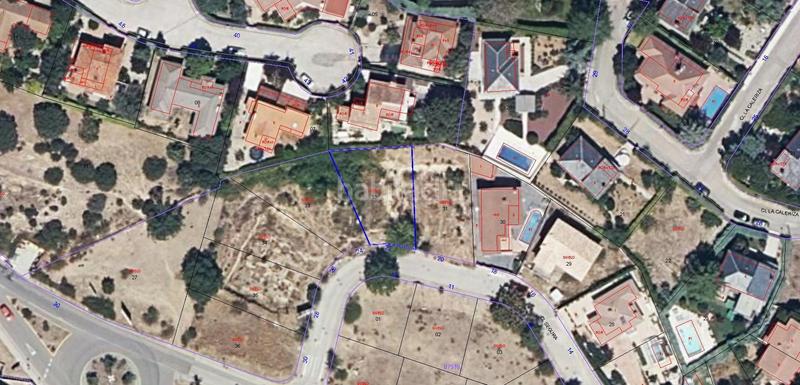 Foto e9266a1a-a782-455c-bd95-e2a82b3c98f3. Terrain résidentiel dans Guadalix de la Sierra