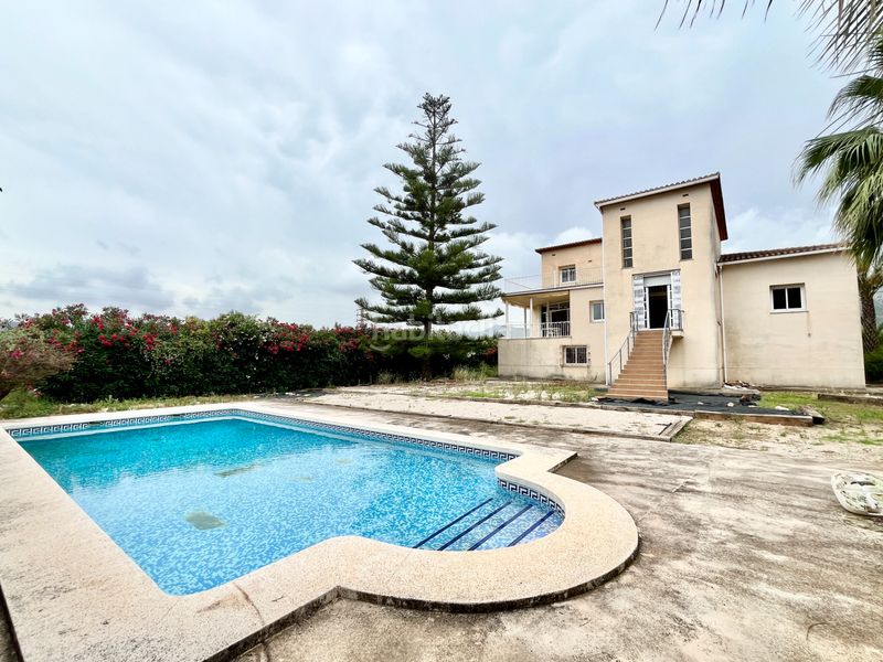 Foto f0b1be95-8ead-4ecb-a337-bdaf79bc068d. Chalet mit kamin heizung parking pool in Ráfol de Almunia