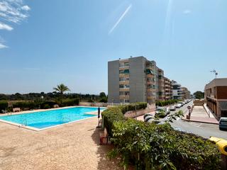 Apartament a Calle arrecife 17. ***amplia vivienda junto playa punta prima con piscina comunitar