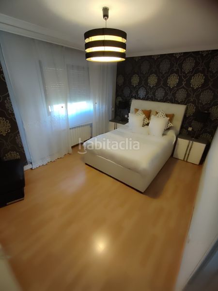 Foto a5b374e5-3a46-4141-8d89-edc08f42e42e. Casa aparellada amb calefacció piscina a Los Villares Arganda del Rey