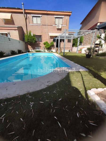 Foto e379a9f1-aa0a-475f-9759-f91f98a5a569. Casa aparellada amb calefacció piscina a Los Villares Arganda del Rey