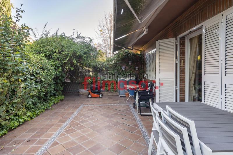 Foto f0fab96b-18d2-41cc-a044-ad0c34c49b40. Casa aparellada amb piscina a El Bosque Villaviciosa de Odón