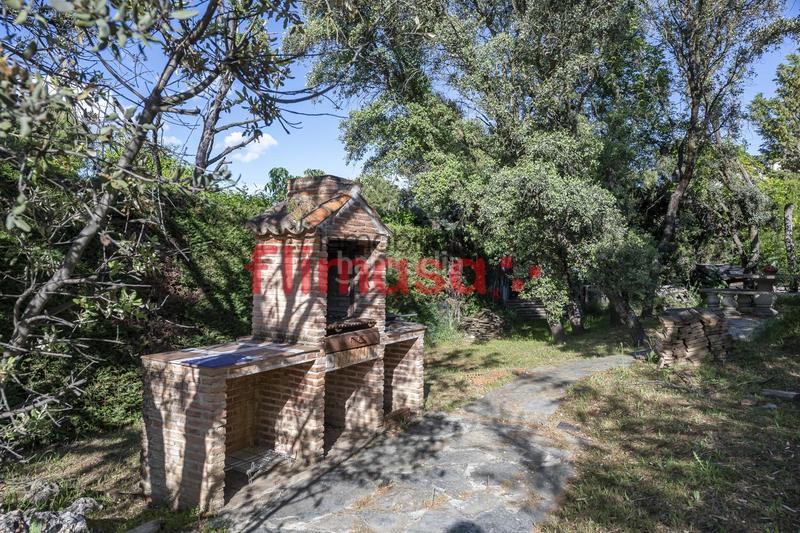 Foto 30f104c5-d3af-432f-8628-e3d87fccdb41. Casa amb calefacció piscina a El Bosque Villaviciosa de Odón