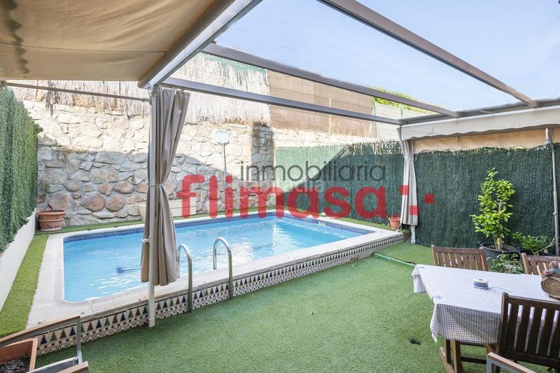 Foto c5eb06e7-010c-4e29-82e1-c50f07cf1bc8. Casa a schiera con piscina in Centro Villaviciosa de Odón