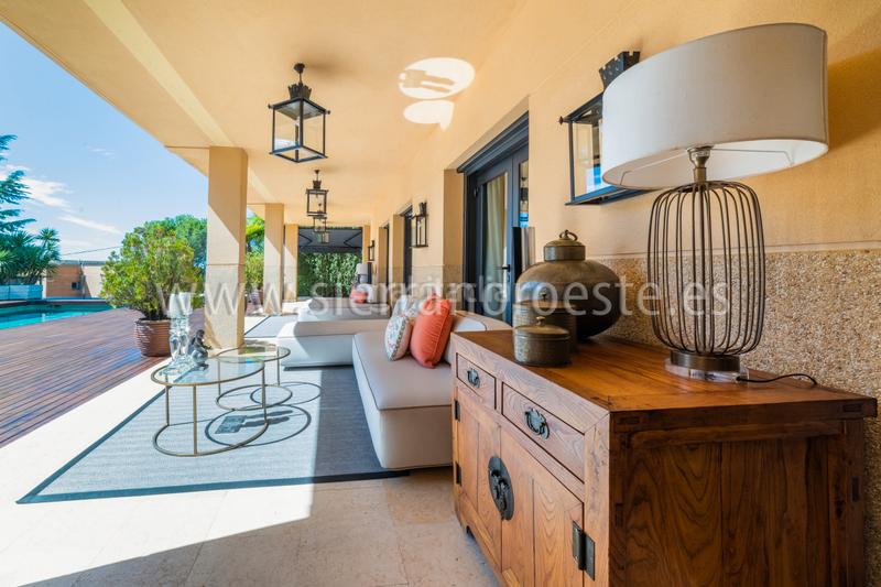 Foto 3a243f8c-6385-4c8d-8eac-a83ba5356c9e. Chalet with fireplace heating parking pool in La Berzosilla Torrelodones