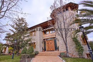 Xalet a El Cantizal. Impresionante chalet de piedra en monte rozas con spa.