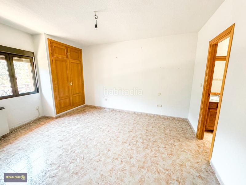 Foto b8d4a24e-b873-4670-a79d-3c8f0534d53e. Casa adossada amb calefacció a Buitrago del Lozoya