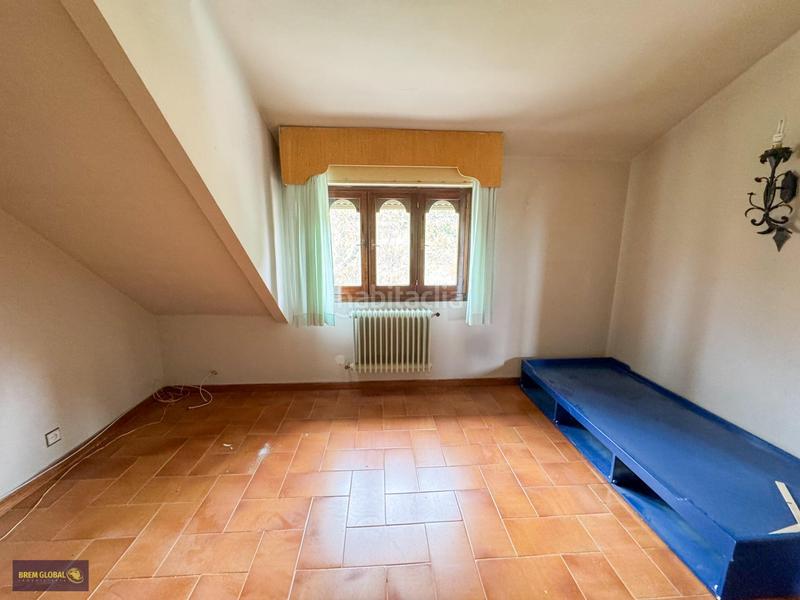 Foto eba58dcc-9d95-4049-ba0c-b35a90db8881. Chalet with heating parking in Bustarviejo