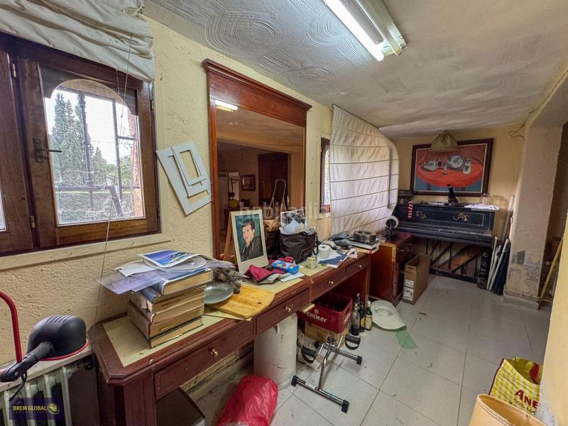 Foto 27c472a2-e907-421d-88d8-6af90256a4b4. Xalet amb calefacció aparcament a Bustarviejo