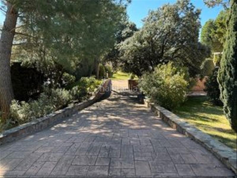 Foto a7924b2f-c3cd-4e49-8f4d-909bba92ed8e. Casa amb xemeneia calefacció aparcament piscina a Boadilla del Monte