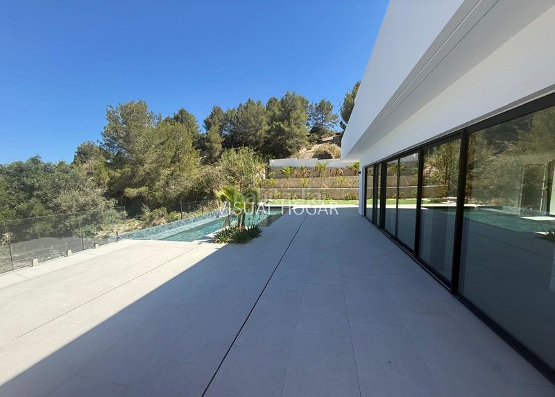 Foto 757bb6f0-2e9b-4bc2-9d4f-500bbba8fb54. Chalet with heating parking pool in La Fustera Benissa