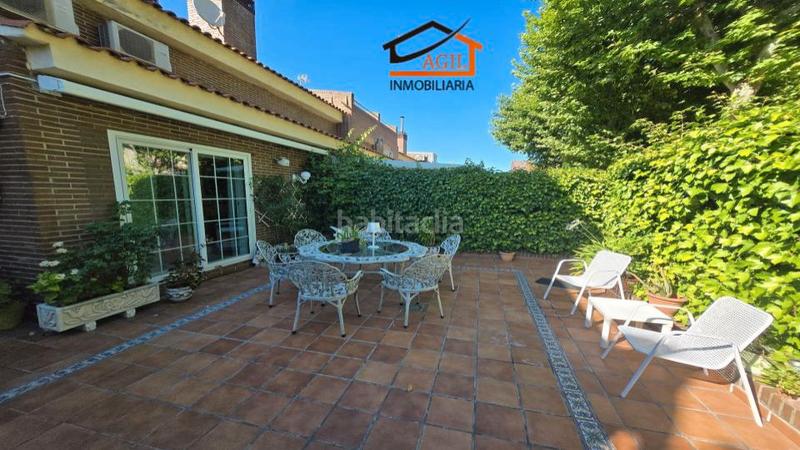 Foto 11639e48-be9f-4969-a50d-0e3a37813e89. Casa adossada amb xemeneia calefacció aparcament a Leganés