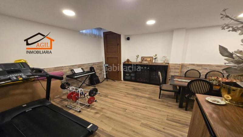 Foto 183ab656-ecaf-4880-8cd5-c5334f346f07. Casa adossada amb xemeneia calefacció aparcament a Leganés