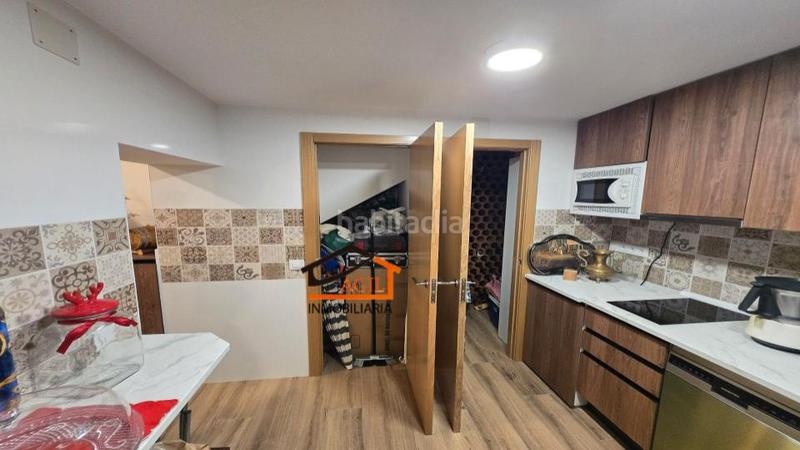 Foto 45c04ab9-5f13-4415-aa3b-feebb9e762de. Casa adossada amb xemeneia calefacció aparcament a Leganés
