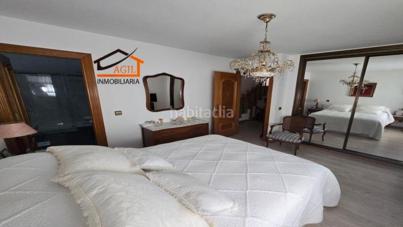 Foto 8b9e7e42-21f0-42a2-b928-baf60c90991b. Casa adossada amb xemeneia calefacció aparcament a Leganés