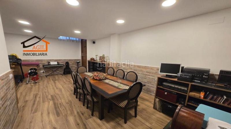 Foto a98f5dae-ae5c-41cb-8745-fea648b13a2f. Casa adossada amb xemeneia calefacció aparcament a Leganés