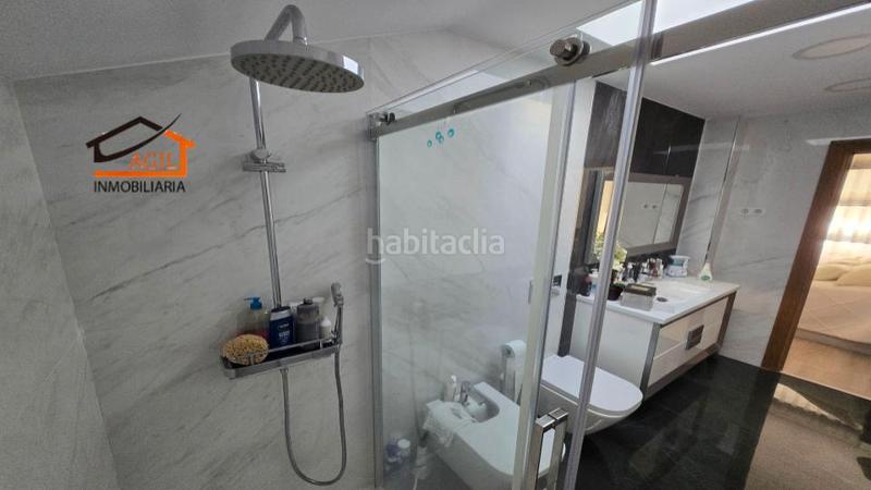 Foto d08f68ec-44cf-46dc-a2ad-0f5f308d91fb. Casa adossada amb xemeneia calefacció aparcament a Leganés