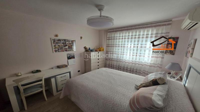 Foto f0640c9e-f10a-4114-9c86-e5b3e4eb37b3. Casa adossada amb xemeneia calefacció aparcament a Leganés