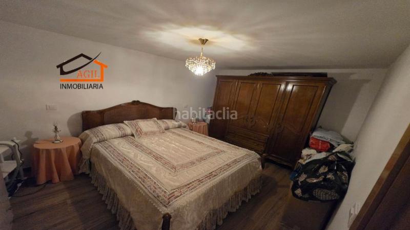 Foto fa5f9441-d802-4c6d-87a4-3e9599f09d20. Casa adossada amb xemeneia calefacció aparcament a Leganés