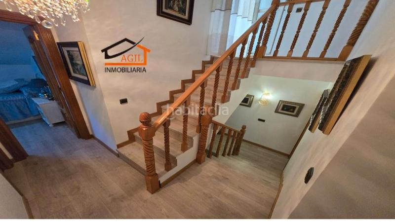 Foto fb1b98da-d0e0-49c9-a406-c353bd7cb8d5. Casa adossada amb xemeneia calefacció aparcament a Leganés