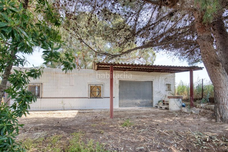 Foto 03f89eb7-e299-43c2-a0eb-ddb132a191f0. Casa amb aparcament piscina a La Marina Elche / Elx