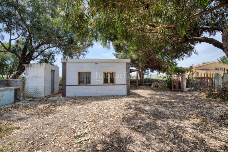 Foto 8546a05c-20a4-47b1-b3fd-0068c418f45f. Casa amb aparcament piscina a La Marina Elche / Elx