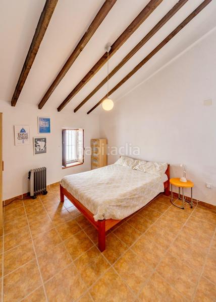 Foto 9ea76cab-c274-4ba9-b94d-d68526869eb6. Masía casa iglesia santa maria casco antiguo en Oliva pueblo Oliva