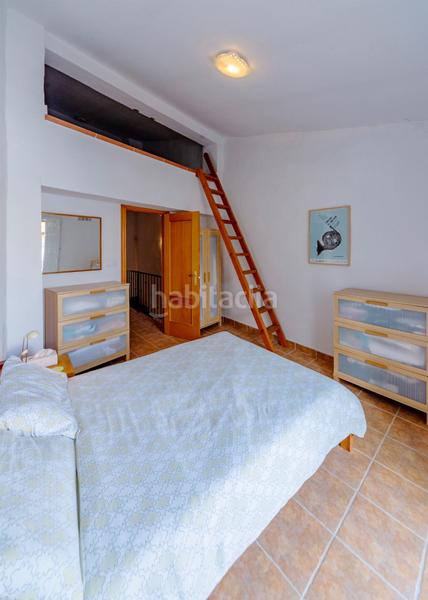 Foto b30acf03-6731-432a-b69c-421ec46ac3a3. Masía casa iglesia santa maria casco antiguo en Oliva pueblo Oliva