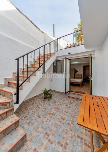 Foto c08d45e6-97a9-4443-a4e8-a4a53e74892c. Masía casa iglesia santa maria casco antiguo en Oliva pueblo Oliva