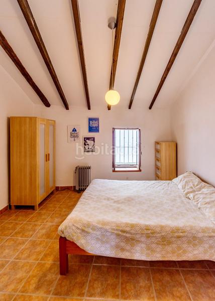 Foto ebc1e7f3-44ac-4b70-bc21-f97047ba29dd. Masía casa iglesia santa maria casco antiguo en Oliva pueblo Oliva