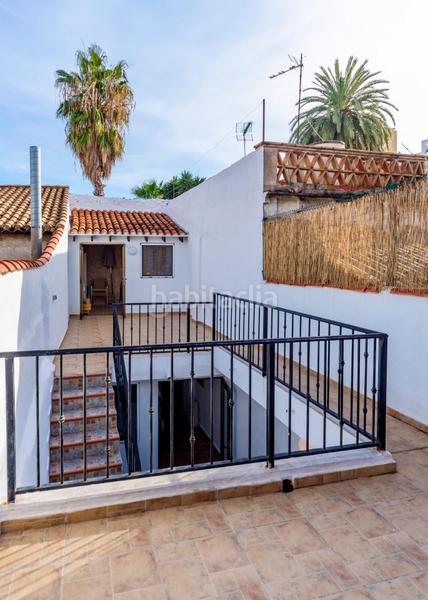 Foto ed422436-b95f-441e-9dbf-becebba5dc87. Masía casa iglesia santa maria casco antiguo en Oliva pueblo Oliva