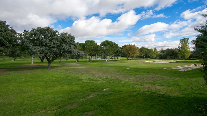 Foto 8ed1e60e-6352-4b48-bf37-d80fa3b95c35. Chalet con riscaldamento parcheggio piscina in urbanización La Moraleja La Moraleja