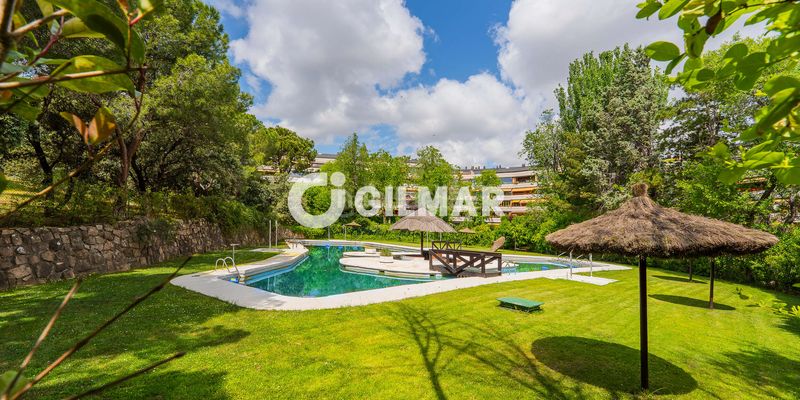 Foto 986d5239-1f42-4ae7-bc50-33c9a0cf637e. Pis amb calefacció aparcament piscina a el soto de La Moraleja La Moraleja