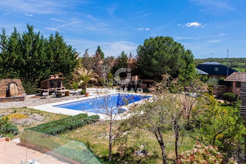 Foto ba43c2f2-5bfc-4023-bfe5-b809a94f02bc. Xalet amb calefacció aparcament piscina a Navalquejigo-Los Arroyos Escorial (El)