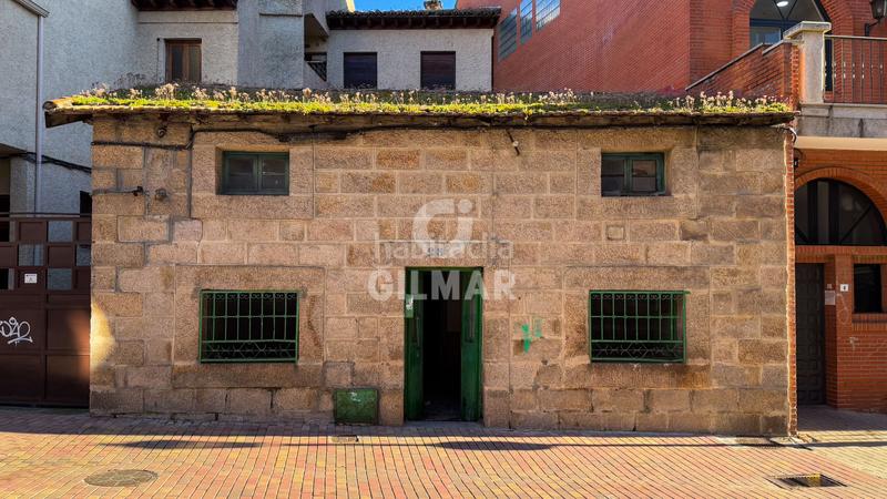 Foto ab37d6d7-f353-4b68-9be4-b30807f49f5e. Chalet descubre el encanto rústico en el corazón ! esta singular casa de piedra, ubicada en pleno centro del pueblo, en Manzanares el Real