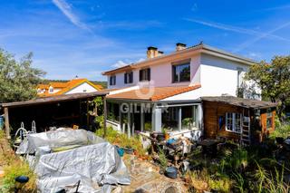 Casa bifamiliare in Hoyo de Manzanares. Descubre el encanto de este chalet ubicado en la exclusiva zona