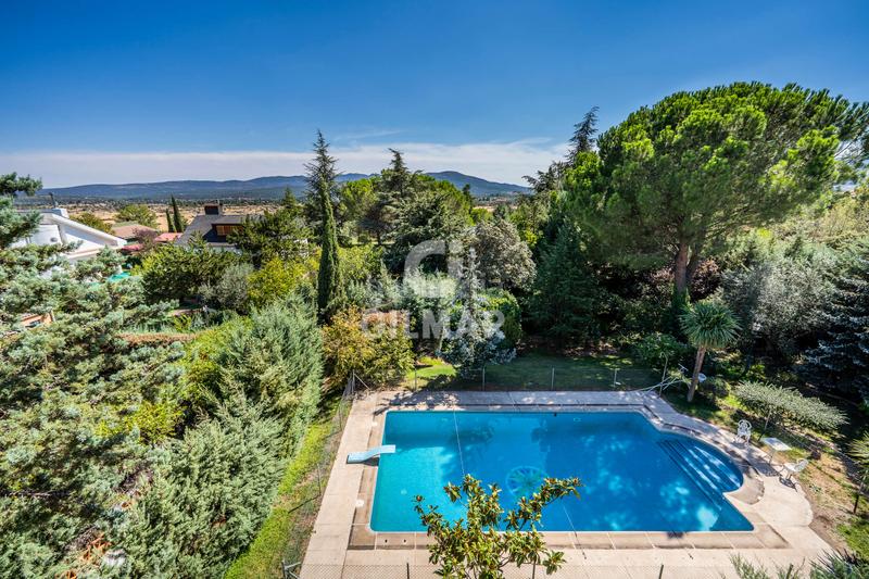 Foto 18baa334-66de-43b3-9611-1e042321215a. Chalet descubre este impresionante chalet independiente con piscina ubicado en becerril, un enclave privilegiado en el noroeste de madrid en Becerril de la Sierra