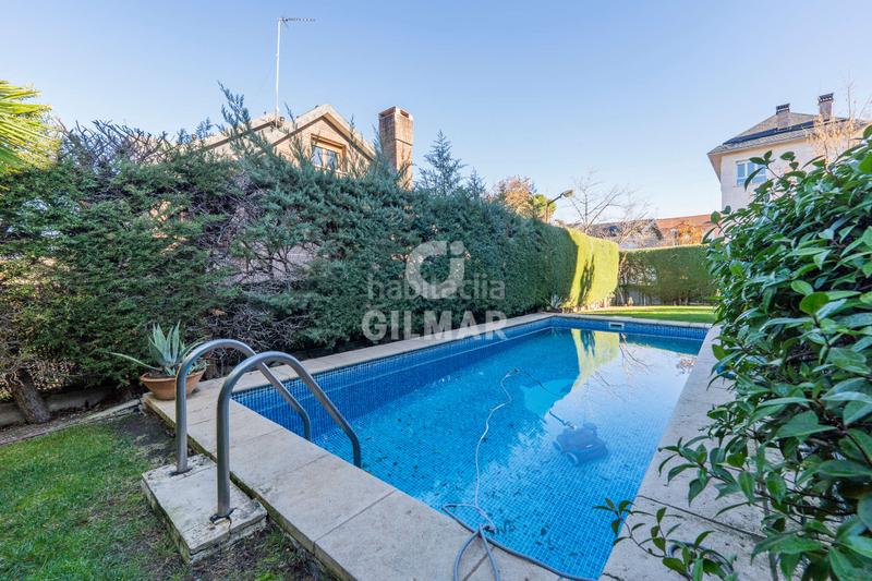 Foto 19239212-dd40-4277-9f13-3a07af180baf. Maison jumelée avec chauffage parking piscine dans Peñagrande Madrid