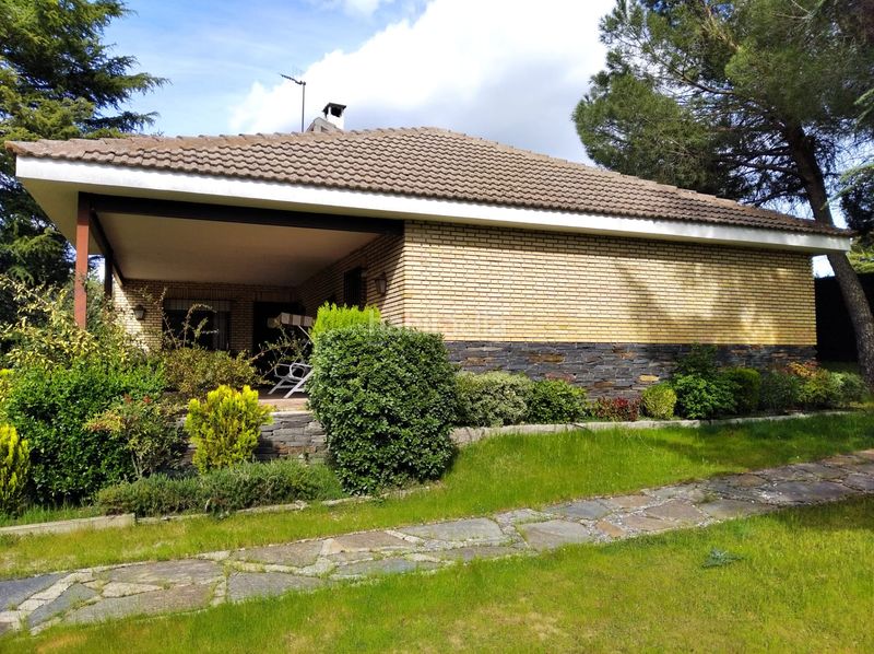 Foto 80d91381-a141-4685-8cef-f5ab1d06a3cb. Chalet con camino riscaldamento parcheggio piscina in Hoyo de Manzanares