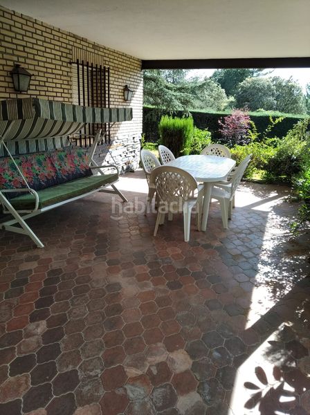 Foto e6948b2a-b3e5-40f4-b1b2-37ab6f1f4dad. Chalet con camino riscaldamento parcheggio piscina in Hoyo de Manzanares