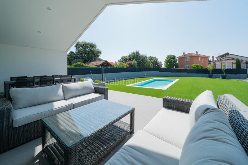 Foto 57d36328-4331-4304-aedc-b4a9d8622c6d. Chalet avec cheminée chauffage parking piscine dans Guadalix de la Sierra