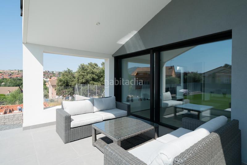 Foto 8f3c2b2b-34c1-4fd4-b317-061246edb29c. Chalet avec cheminée chauffage parking piscine dans Guadalix de la Sierra