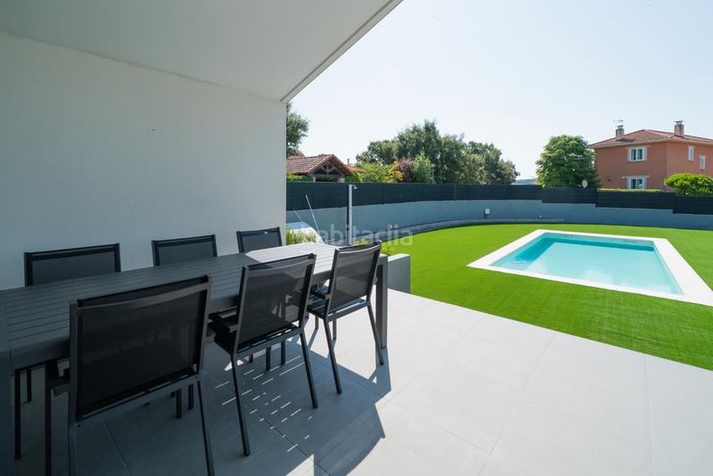 Foto b99425e1-96bb-480f-a2d6-d173fc146a2a. Chalet avec cheminée chauffage parking piscine dans Guadalix de la Sierra