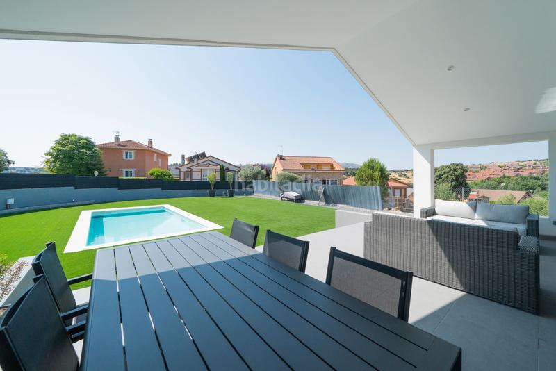 Foto f20a1365-a1cd-459d-9a7d-94a8d31167c3. Chalet avec cheminée chauffage parking piscine dans Guadalix de la Sierra