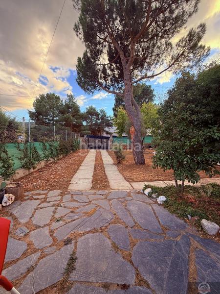 Foto 6e719143-ece5-4645-81d1-4df3fe7278c8. Casa aparellada amb calefacció aparcament a Becerril de la Sierra