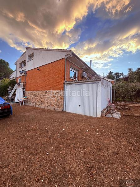 Foto 9e7f20fb-2a10-4dc8-89a7-e5a860cff9f3. Casa aparellada amb calefacció aparcament a Becerril de la Sierra