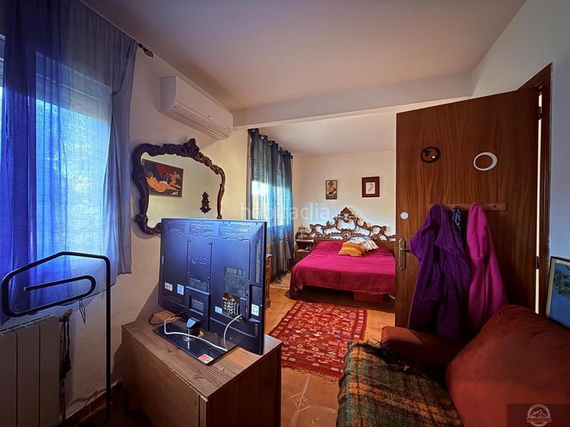 Foto da09429d-14cb-44e9-a952-50a32aae46ff. Casa aparellada amb calefacció aparcament a Becerril de la Sierra