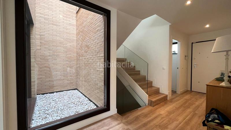 Foto e4acdfbb-7e7e-4016-a334-a8de1edca488. Casa aparellada amb xemeneia calefacció aparcament piscina a Torrelodones