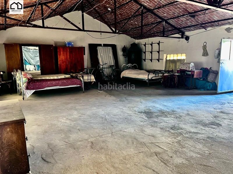 Foto ecb97095-e9f0-4ecd-a19f-677c91e648bb. Masía apihouse vende casa de pueblo en planta baja con amplia parcela de 265 m2. precio 77.999 en Carmena