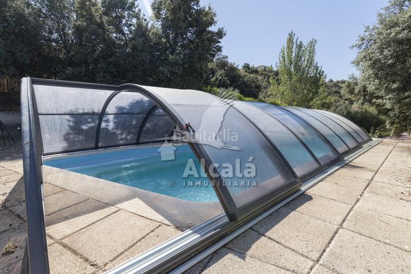 Foto d7fd1bfd-f6d9-4e1e-a616-4fbfca672b9d. Casa exclusivo chalet independiente madrid en Ambite